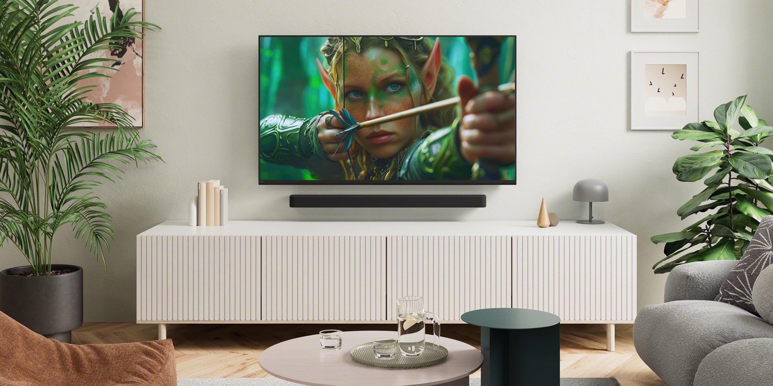 Cozy living space with wall-mounted TV and fantasy movie scene